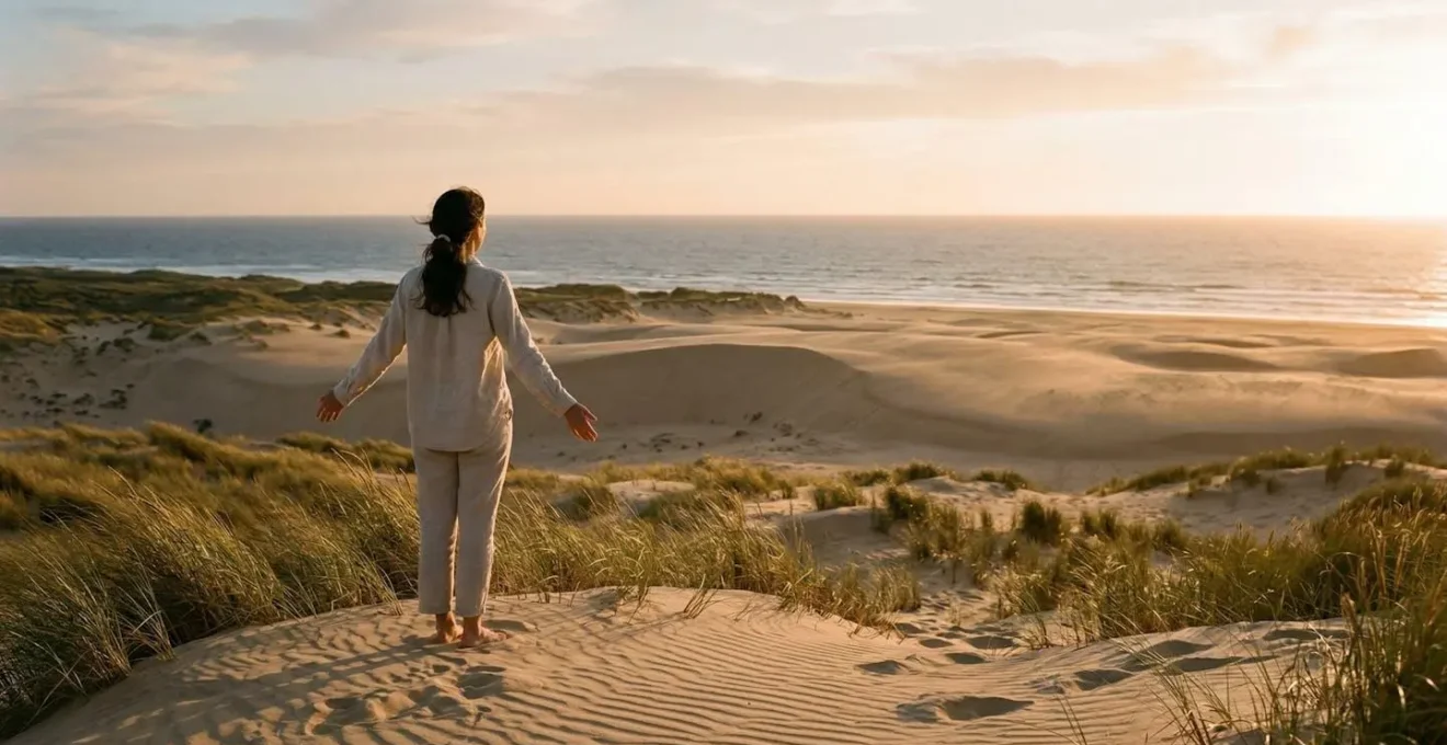 Personne de dos contemplant un paysage naturel sauvage dans une posture de communion avec la nature